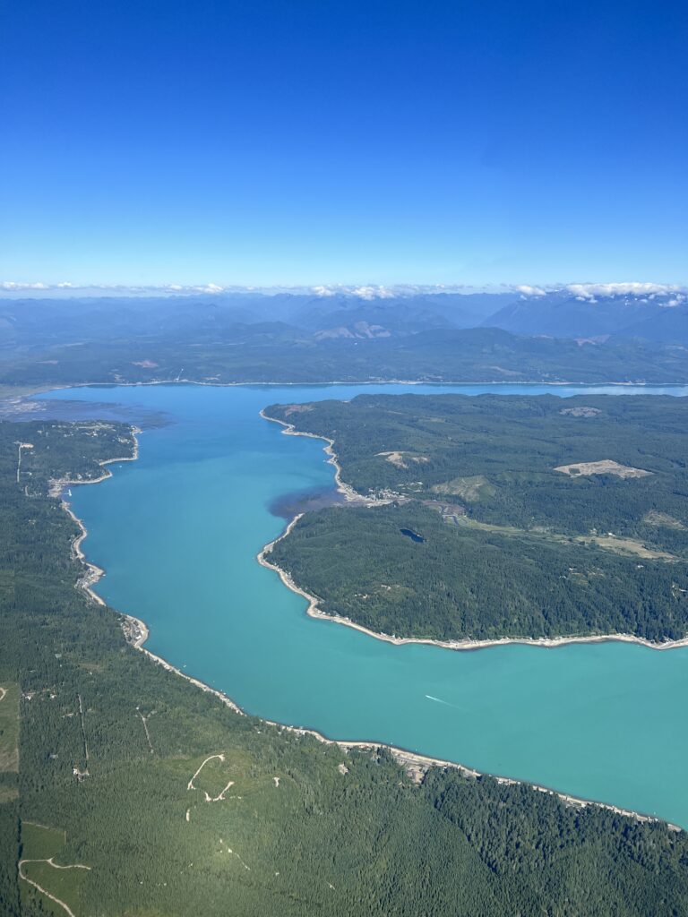 Aerial photo of the turquoise waters of Hood Canal, 2 July 2023 by Daryl Greaser 