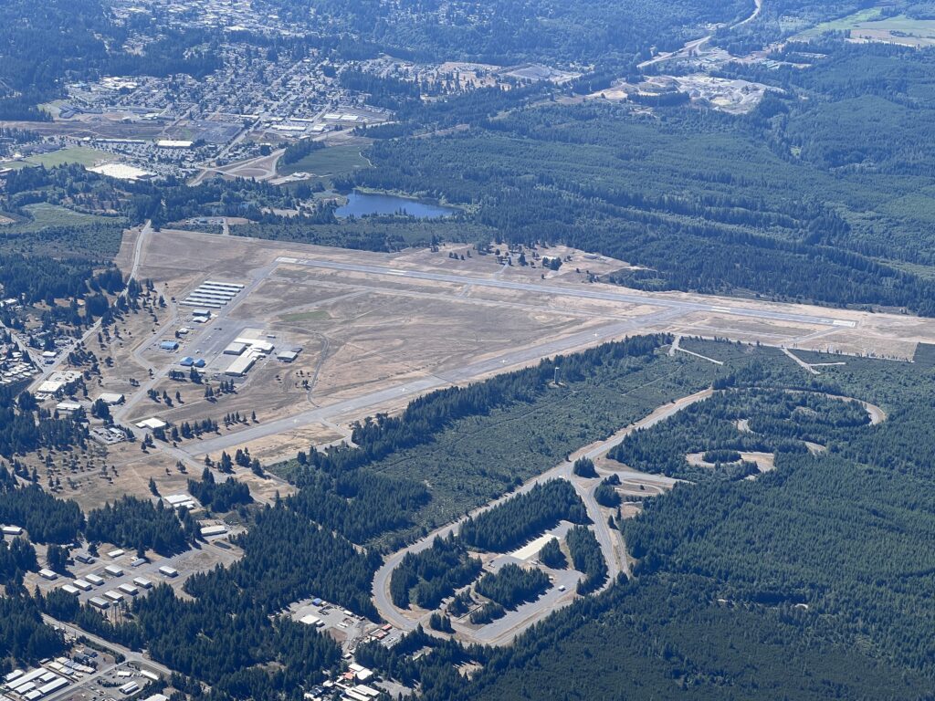 Aerial photo of Sanderson / Shelton Field (SHN) with Washington State Highway Patrol Academy visible. 2 July 2023 by Daryl Greaser 