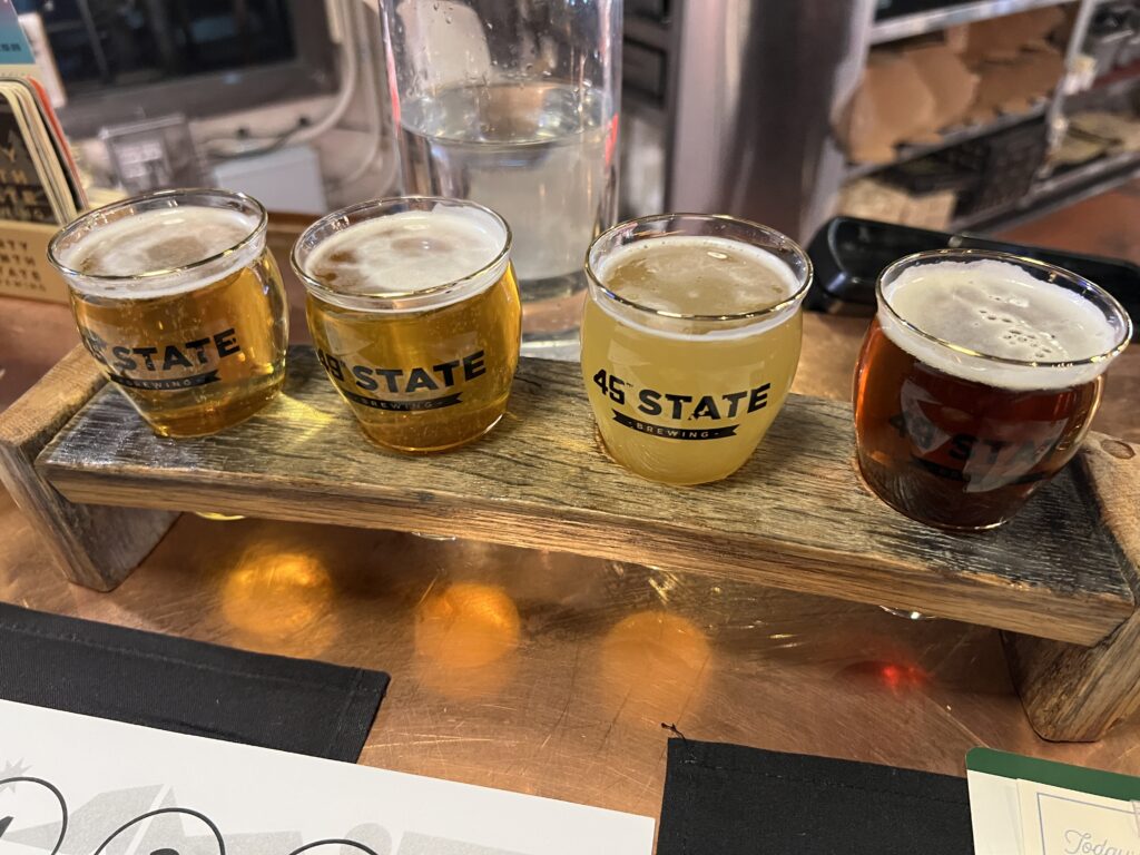 Taster flight at 49th State Brewing